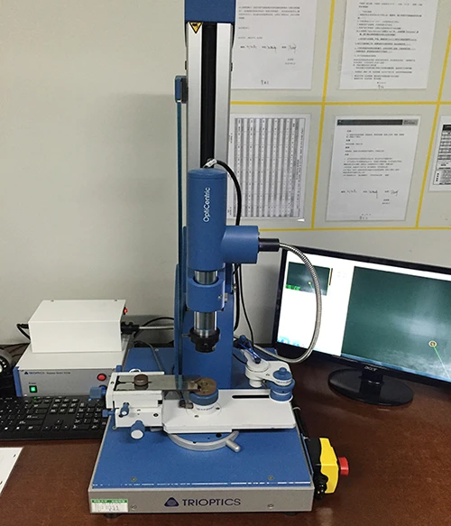 OptiCentric Auto-Centering System — Hermitin Optical Manufacturing Facility